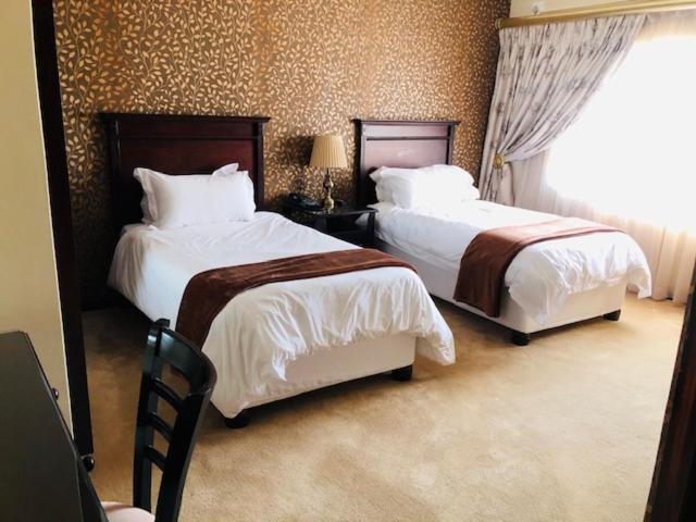Ekupholeni Garden Villas มันซีนี ภายนอก รูปภาพ